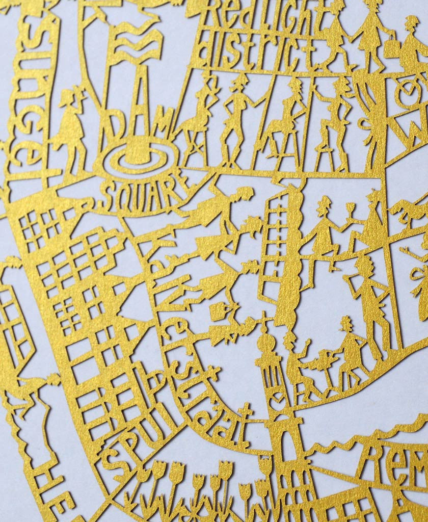 Detail of Amsterdam paper cut map in gold
