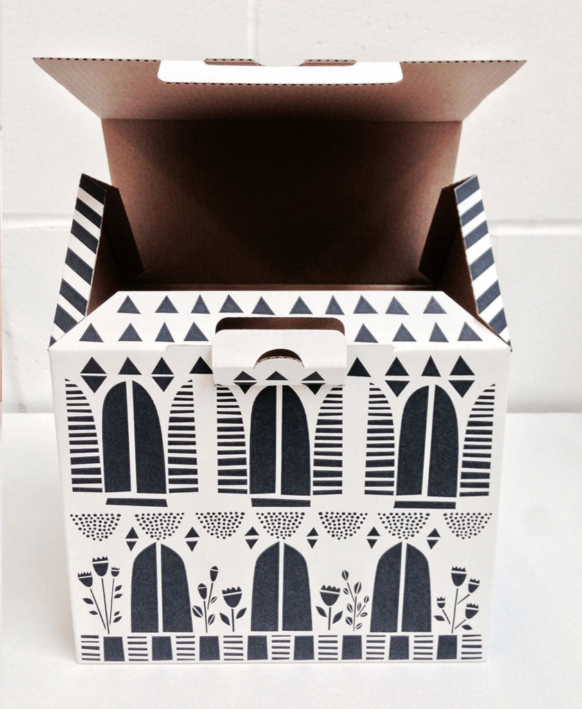 House Boxes, this wonderful pack of four houses is a fantastic solution for storing all of your small objects in a stylish and fun way. Just open up the roof to put things in the House Box!